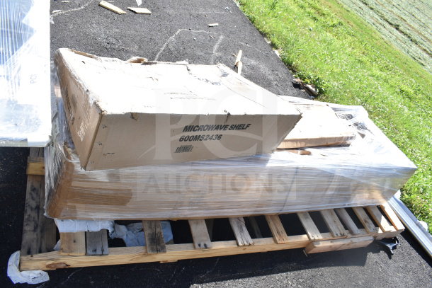 Boxes of brand new Ballymore ladder, Regency shelves, and Metro shelf on a pallet, partially shrink-wrapped.