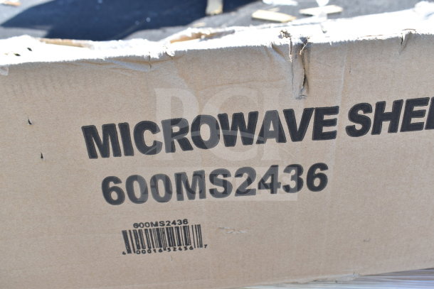 Cardboard box labeled "MICROWAVE SHELF 600MS2436" with barcode, indicating a Regency stainless steel microwave shelf. Box appears slightly damaged.