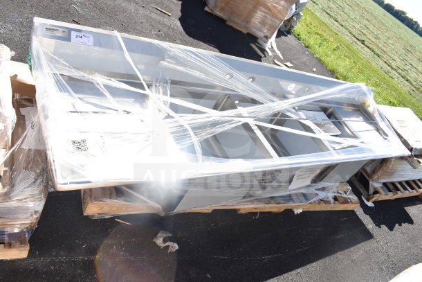 Brand new Regency 600S32424224 commercial 3 bay sink with dual drain boards, wrapped and labeled as scratch and dent.