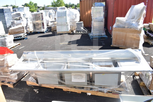 Brand new Regency 600S32424224 commercial 3 bay sink with dual drain boards, wrapped on pallet. Scratch and dent condition.