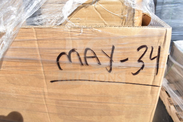 Cardboard box labeled "MAY-34" in black marker, containing 8 new scratch and dent items, including a sink and evaporator coil.
