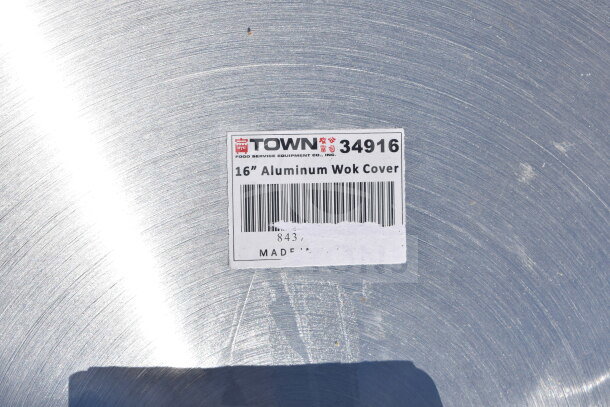 16" Aluminum Wok Cover, label reads "Town 34916", in new condition with minimal scratches.
