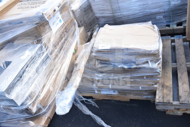 Pallet of 15 new scratch and dent items, including waitress station and table base, wrapped in plastic for auction.