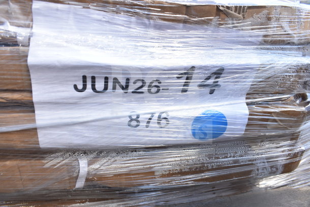 Plastic-wrapped pallet of 15 new scratch-and-dent items, including waitress station and table base, with label "JUN26-14".