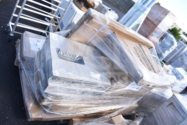 Twelve brand new scratch and dent items, including a shelf kit and cake stand, wrapped in plastic, visible tags.