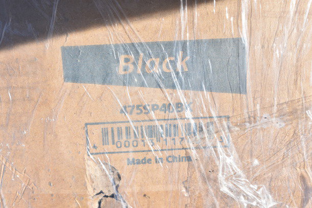 Box with "Black" label, model 475SP40BX, "Made in China," wrapped in plastic, part of scratch and dent auction.