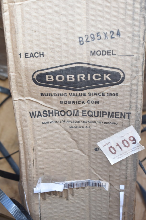 Bobrick washroom equipment box, model B295X24, with scratch and dent condition. Made in USA, includes label with code 0109.