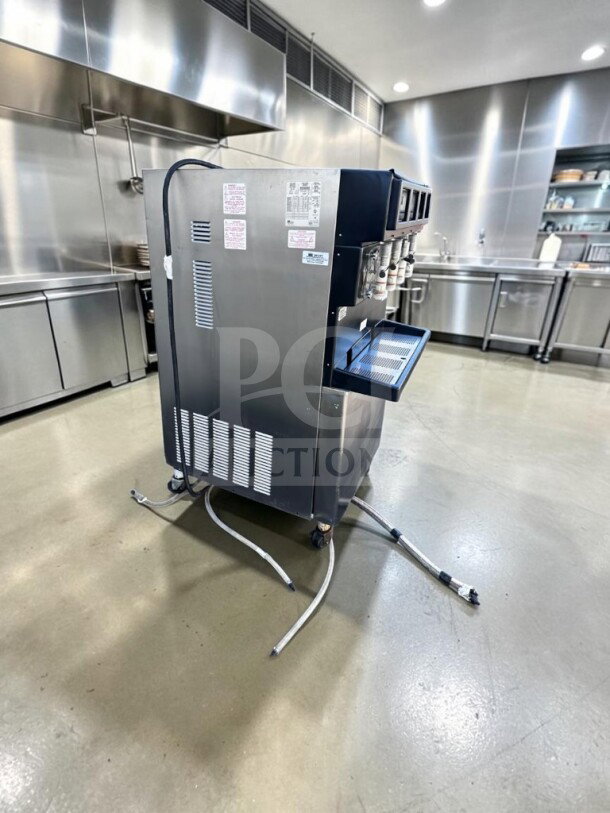 Taylor 349-33 4-flavor commercial frozen beverage machine, 208–230V, 3 phase. Tested, UL/NSF listed, exceptional condition.