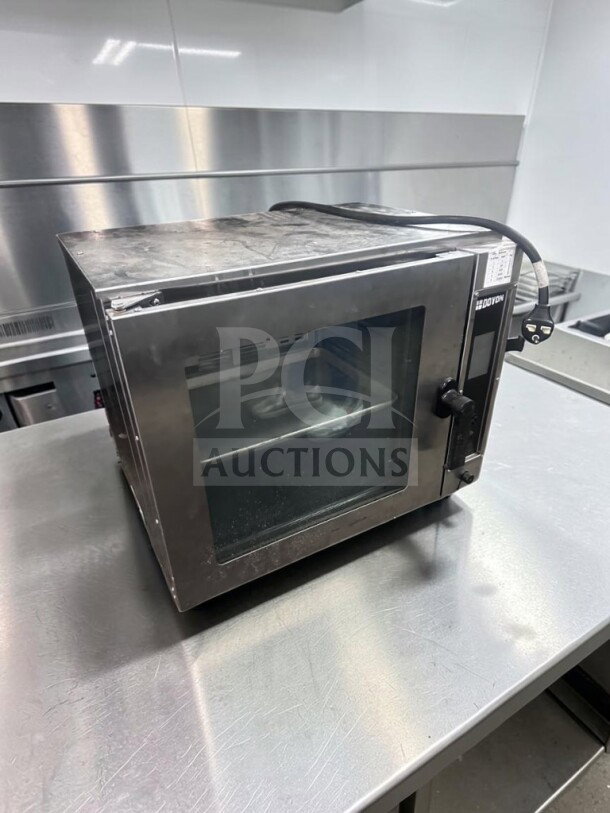 Doyon DCOT5 electric countertop half-size convection oven, superior condition, 208V, single phase, ETL/NSF certified.