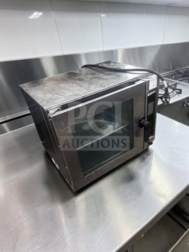 Doyon DCOT5 electric countertop half-size convection oven, stainless steel, superior condition, ETL/NSF certified, 208V single-phase.
