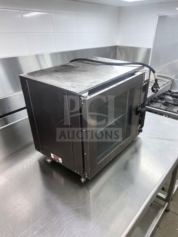 Doyon DCOT5 electric countertop convection oven, half-size, superior condition, 208V, ETL/NSF certified, fully tested.