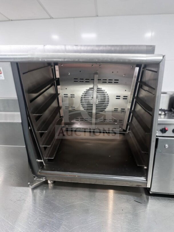 Doyon DCOT5 electric countertop convection oven in superior condition; 208V, single-phase, ETL/NSF certified.