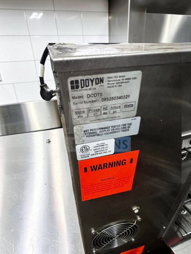 Doyon DCOT5 electric countertop convection oven, 208V, single phase, ETL/NSF certified, superior condition, model tag visible.