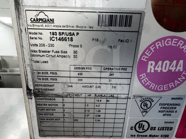 Carpigiani 193 SP/USA P soft serve machine, 2-flavor + twist, 208–230V, 3-phase, UL/NSF listed, model tag details visible.