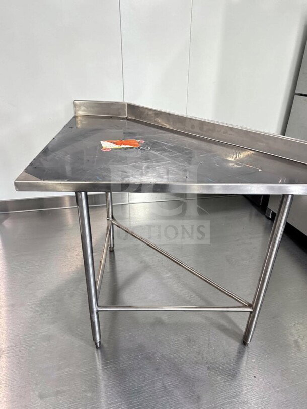 Pristine Wasserstrom 48" stainless steel work table, 3-sided backsplash, NSF certified, new scratch & dent, model WAS-S-PREP-1101.