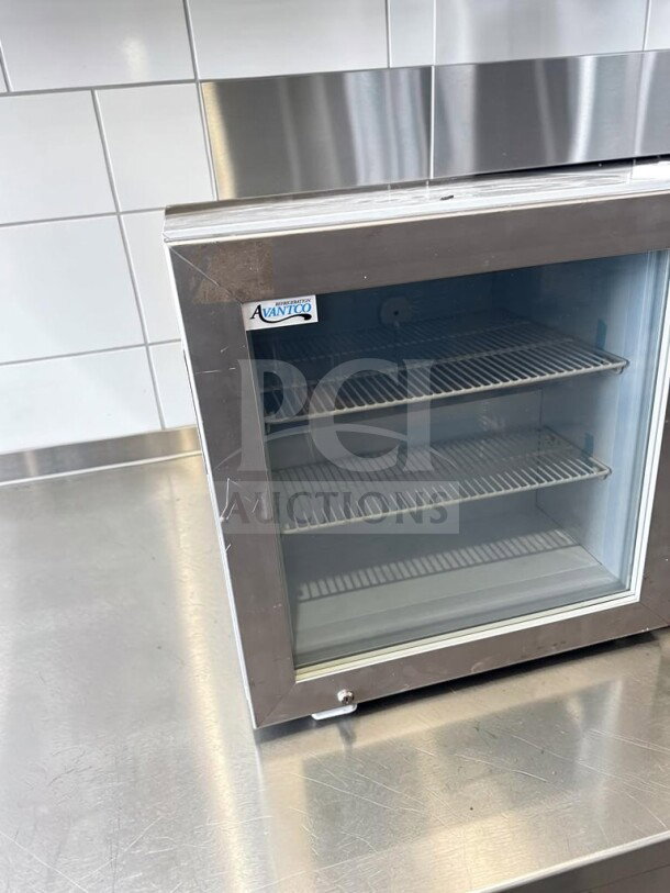 Avantco CFM2 2 Cu. Ft. Countertop Glass Door Display Freezer, in excellent condition, ETL certified, with visible shelving.