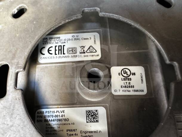Axis P3715-PLVE camera identification labels, including model number, UL listing, and power specifications.
