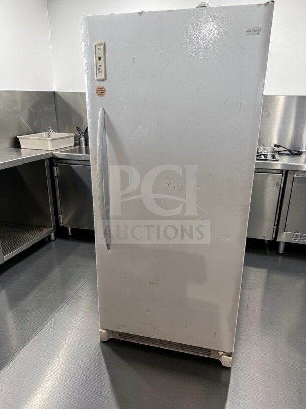Frigidaire FFU21F5HWY 33" 20 Cu. Ft. upright freezer, single-door, white, garage-ready, CSA certified, fully operational.