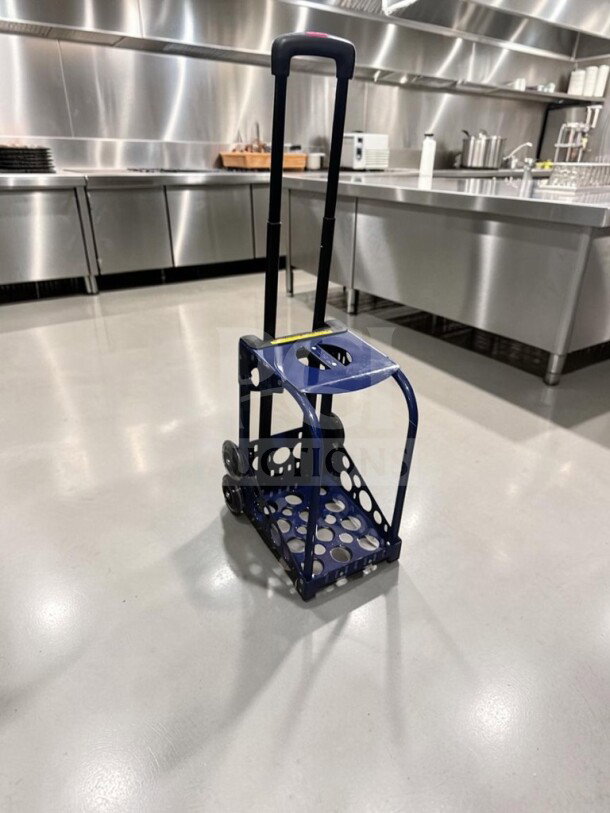 ZUCA Sport Frame rolling cart in navy blue with built-in seat and flashing wheels, fully inspected and in excellent condition.