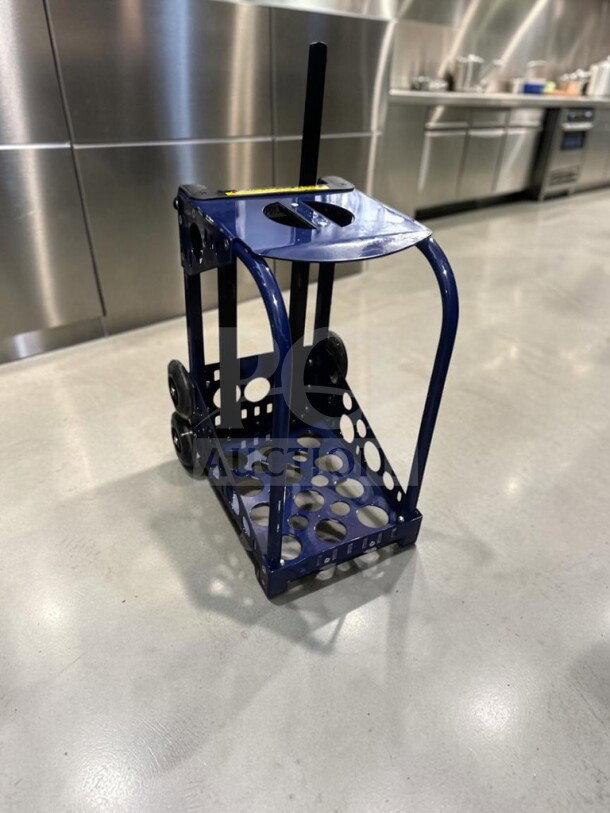 ZUCA Sport Frame rolling cart in navy blue, excellent condition, with built-in seat and flashing wheels, fully inspected.