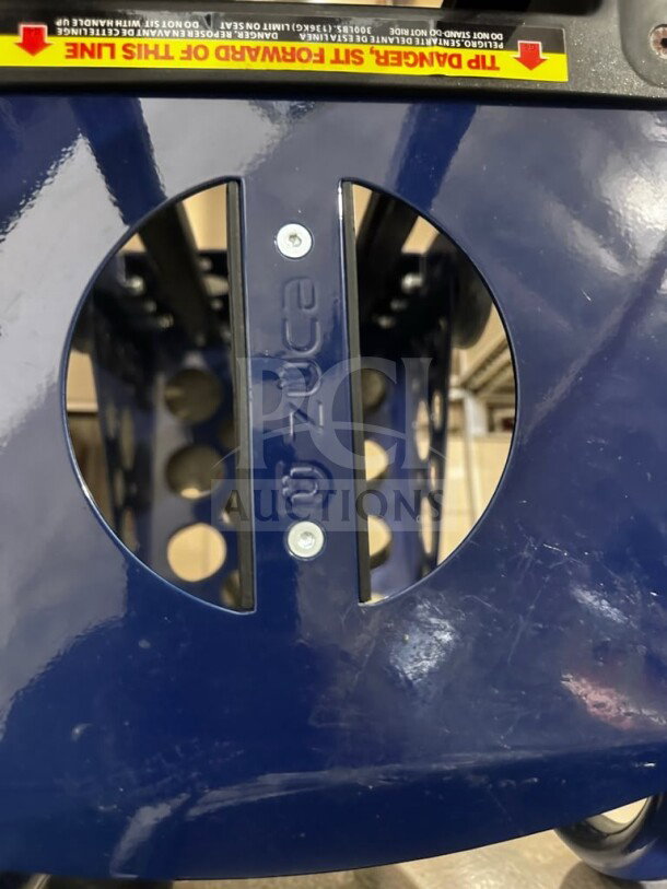 ZUCA Sport Frame, navy blue, rolling cart with built-in seat, excellent condition, inspected, flashing wheels, warning label shown.