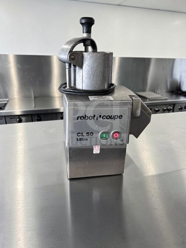 Robot Coupe CL50E Ultra food processor, immaculate condition, includes 2 discs, 1 1/2 HP, 120V, ETL listed, fully tested.