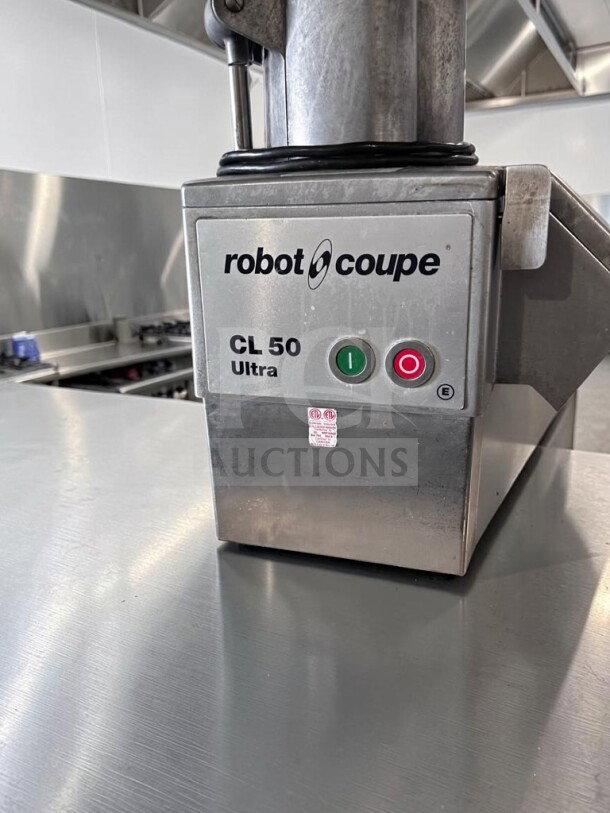 Immaculate Robot Coupe CL50E Ultra food processor, continuous feed, 1 1/2 HP, 120V, ETL listed, like new condition.