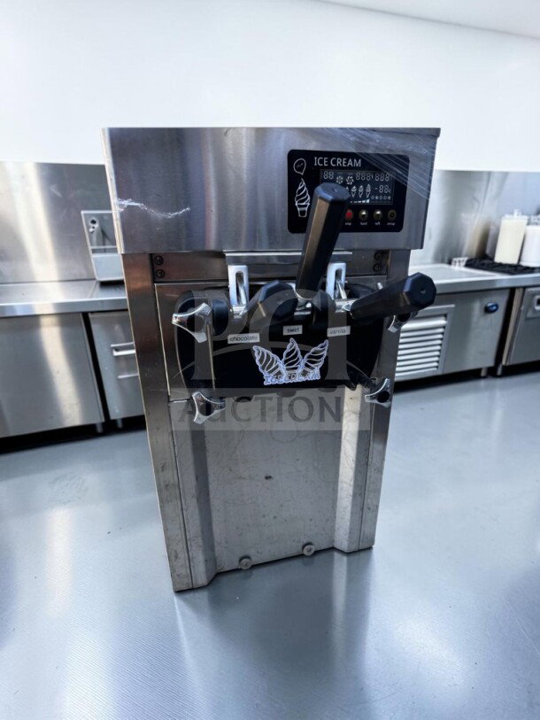 VEVOR ZM-A168 soft serve ice cream machine, like-new, 2+1 flavors, 5 gal/h, stainless steel, tested and operational.