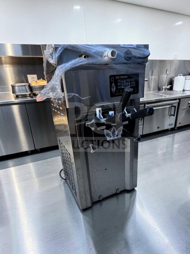 Like-new VEVOR ZM-A168 soft serve ice cream machine, 2+1 flavor, 5 Gal/H, 110V, 1200W, fully tested, stainless steel finish.