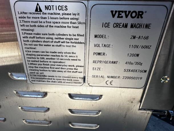 VEVOR ZM-A168 ice cream machine label showing model, 1200W power, 110V voltage, size 53x40x76cm, refrigerant 410a/350g.