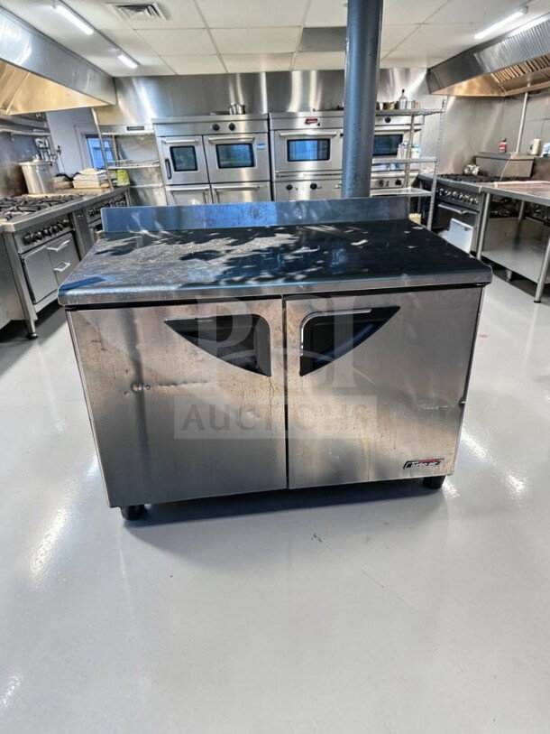 Turbo Air TWR-48SD-N 48" two-door worktop refrigerator in well-maintained condition, stainless steel, ETL/NSF certified.