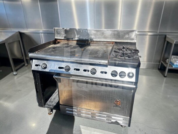Wolf C48S-2B36G gas restaurant range with 2 burners, 36" griddle, oven, stainless steel, 155,000 BTU, excellent condition.
