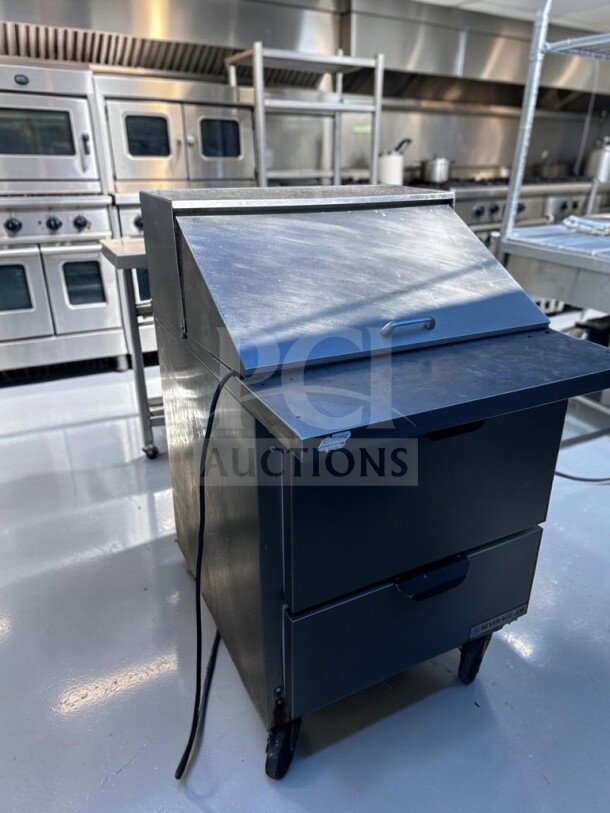 Beverage-Air SPED27HC-12M-B 27" Mega Top Refrigerated Prep Unit in optimal condition, with drawers, 6.8 cu. ft. capacity.