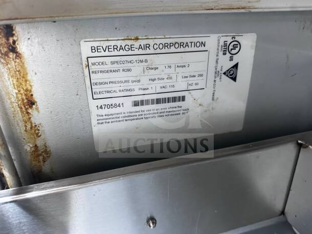 Beverage-Air SPED27HC-12M-B label showing model, refrigerant R290, UL and NSF listings, and electrical ratings.