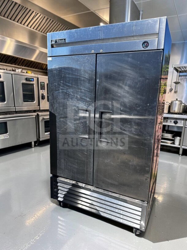 True T-49F two-section reach-in freezer in exceptional condition, stainless steel, 54 1/8", UL/NSF listed, fully tested.