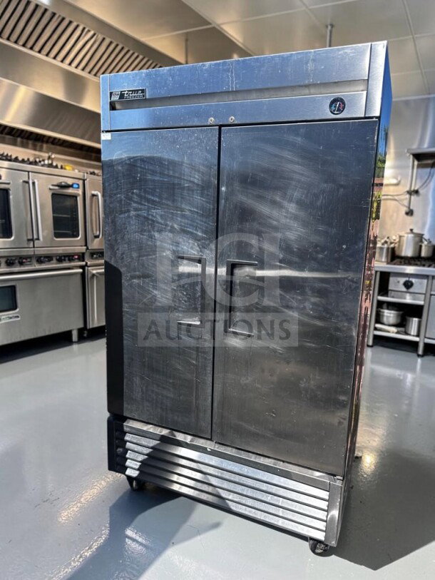 True T-49F two-section solid door reach-in freezer, UL/NSF listed, R404A, excellent condition, fully tested.