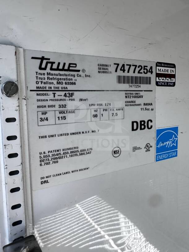 True T-49F label displaying model, voltage, refrigerant, and certification details. Made in USA, NSF and UL listed.