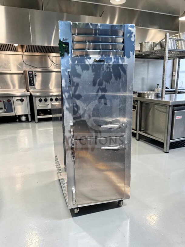 Traulsen RHT132WUT-HHS refrigerator, stainless steel, half-door, 24.2 cu. ft., UL/NSF listed, excellent condition, tested operational.