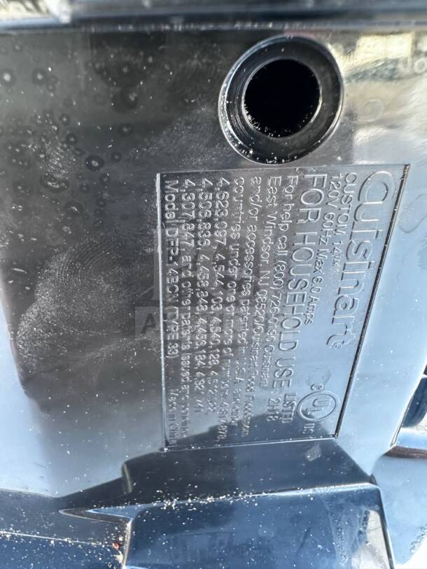 Label on the Cuisinart DFP-14BCNY food processor, showing model details and UL certification.