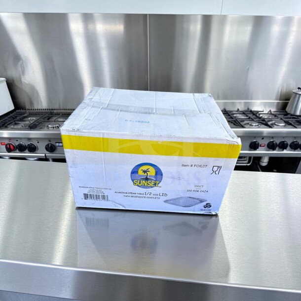 Box of 100 Sunset Brands FOIL07 aluminum steam table 1/2 size lids, new condition, disposable pan covers for catering.