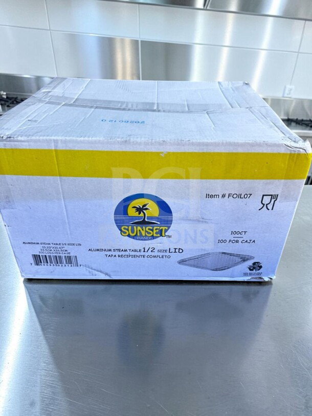 Brand new Sunset Brands FOIL07 aluminum steam table 1/2 size lids, 100 count case, disposable catering pan covers.
