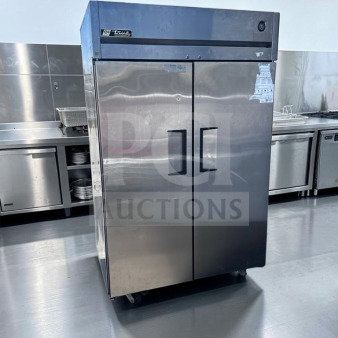 True TG2R-2S reach-in refrigerator, 56 cu. ft., solid doors, stainless steel, UL/NSF listed, excellent condition, 115V.
