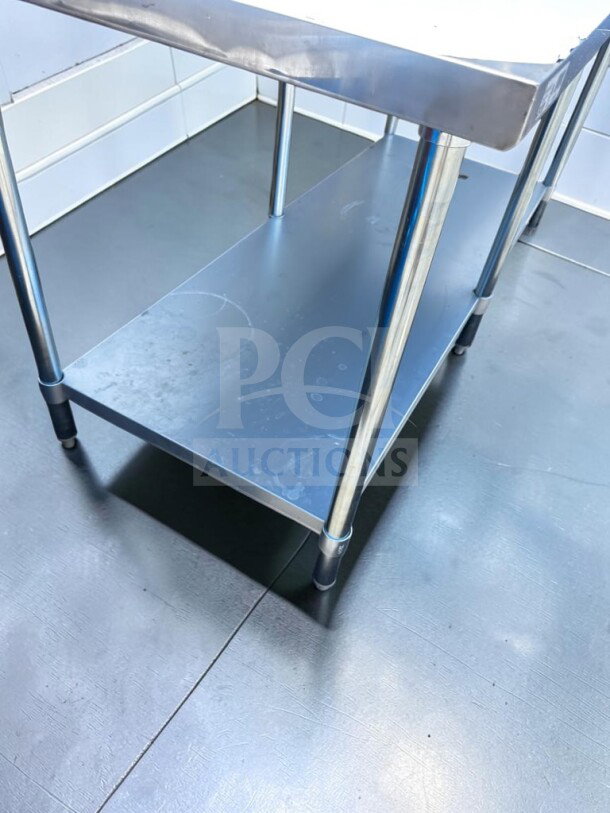 Brand new GSW WT-EE3072 72" x 30" stainless steel work table, galvanized undershelf, 6-leg design, ETL certified, scratch & dent condition.