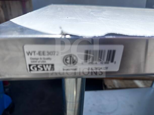 Brand new GSW WT-EE3072 stainless steel work table with galvanized undershelf, 6-leg design, ETL certified, scratch & dent.