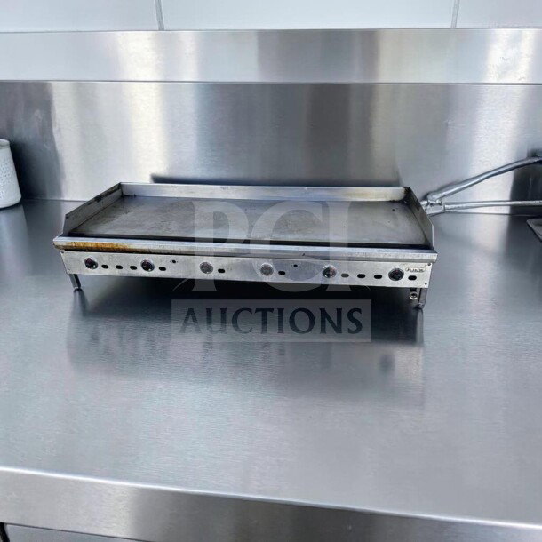 Elite condition Jade Range JGT-2472 commercial gas griddle, 72-inch, thermostatic controls, 180,000 BTU, stainless steel.
