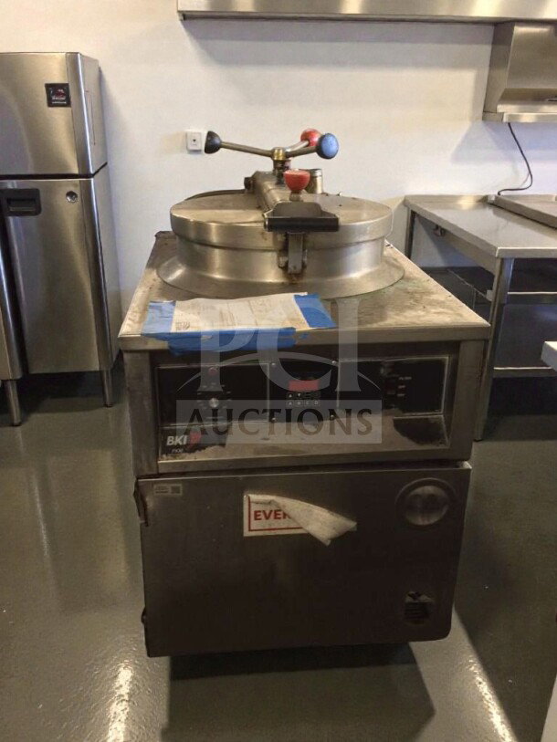 BKI Commercial Pressure Fryer, floor model in stainless steel. Premium condition, fully tested and working. Model BKI-L-PFR-0278.