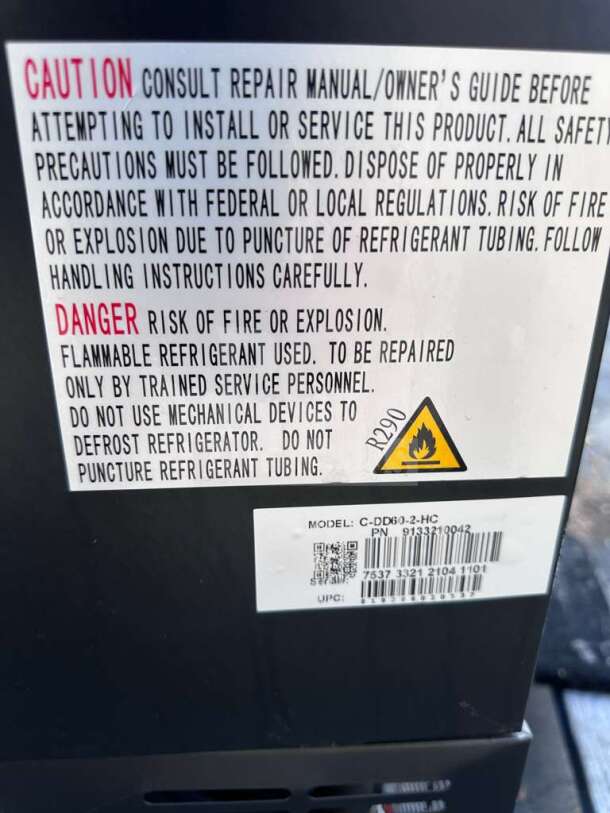 Warning label on Migali Industries C-DD60-2-HC kegerator detailing safety precautions and model information.