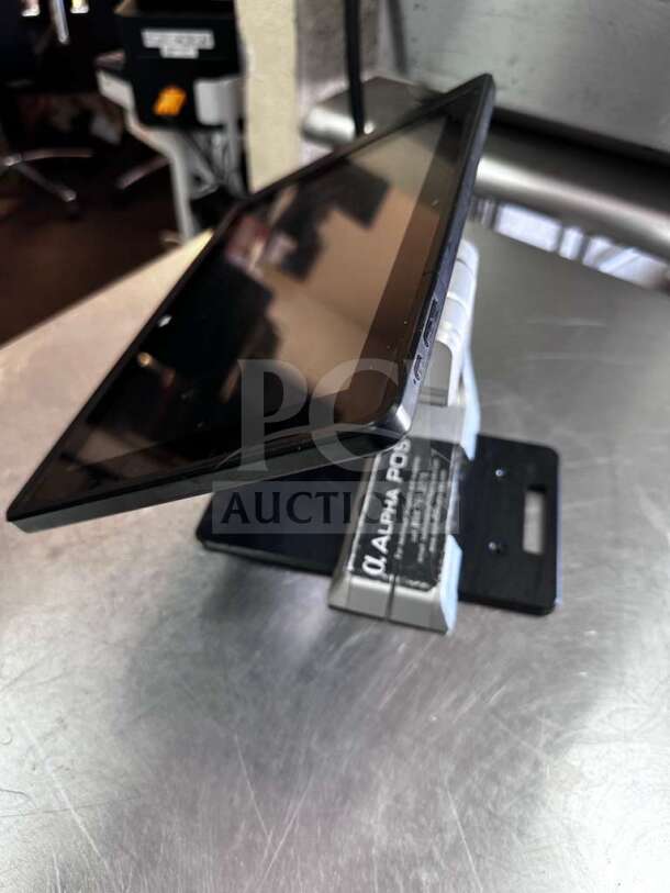 Pioneering DASH10EA 10.1" touch screen tablet mPOS system, commercial POS terminal in excellent condition on a stand.
