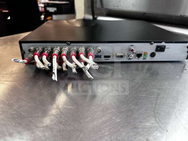 Hikvision DS-7216HQI-K2 DVR, 16-channel, TurboHD, elite condition, fully operational, visible ports, professional setup.