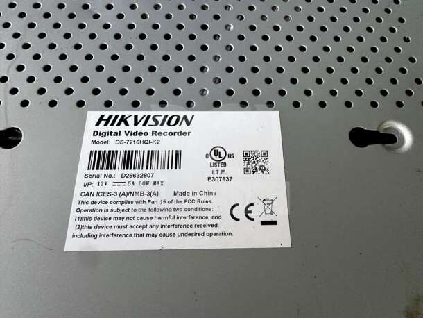 Hikvision DS-7216HQI-K2 DVR label shows model, serial number, and compliance info. 16-channel TurboHD, fully tested, elite condition.